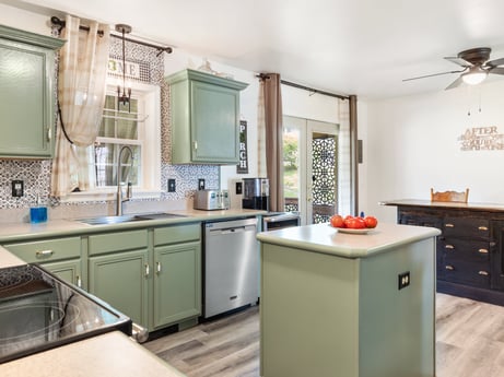 A kitchen at 105 Thomas St featuring: cabinetry, kitchen sink, countertop, sink, furniture, kitchen, drawer, interior design, kitchen appliance, home appliance