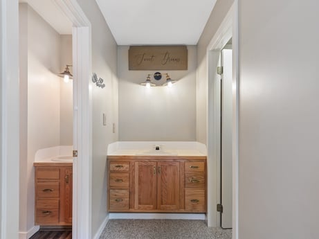 An image featuring bathroom cabinet, furniture, cabinetry, property, building, mirror, plumbing fixture, wood, house, tap at 276 Mountain View Ln.