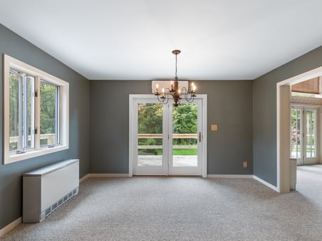 An image featuring window, building, fixture, wood, shade, wood stain, living room, plant, hall, flooring at 276 Mountain View Ln.
