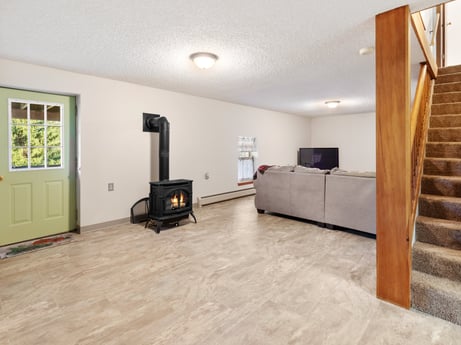 An image featuring building, interior design, hall, houseplant, wood, floor, flooring, hardwood, door, condominium at 62 Leons Rd.