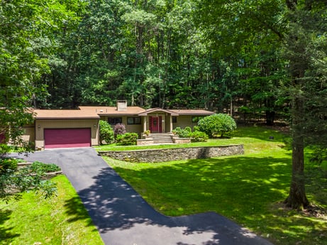 An image featuring plant, tree, natural landscape, land lot, shade, grass, groundcover, landscape, shrub, cottage at 104 Stony Mountain Rd.