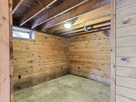 An image featuring wood, building, flooring, floor, house, wood stain, beam, hardwood, plank, siding at 815 Lakeside Dr.
