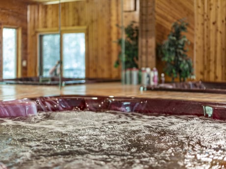 An image featuring property, wood, architecture, flooring, floor, building, wood stain, wall, grass, hardwood at 104 Stony Mountain Rd.