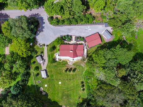 An image featuring property, plant, natural landscape, land lot, urban design, grass, groundcover, landscape, shrub, tree at 276 Mountain View Ln.