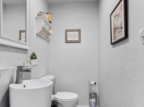 An image featuring picture frame, property, photograph, interior design, grey, paint, plumbing fixture, line, sink, bathroom at 17899 US-6.