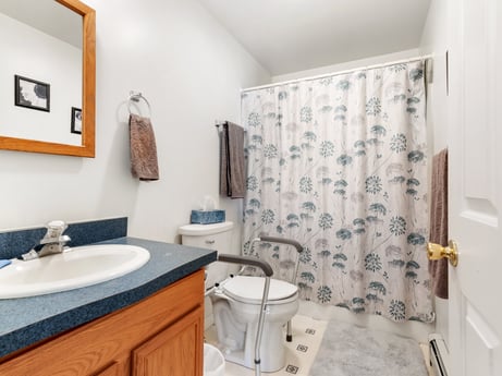 An image featuring plumbing fixture, sink, property, bathroom cabinet, mirror, tap, picture frame, bathroom, purple, interior design at 105 Thomas St.