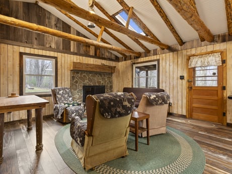 An image featuring furniture, table, window, wood, building, interior design, flooring, floor, couch, beam at English Hollow Ln.