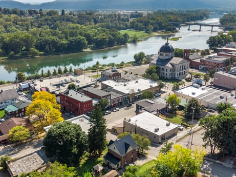 An image featuring water, building, property, plant, nature, tree, architecture, window, urban design, sky at 213 Main St.