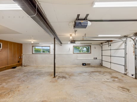 An image featuring hall, building, flooring, wood, house, ceiling, electricity, door, event, concrete at 491 Hillcrest Dr.