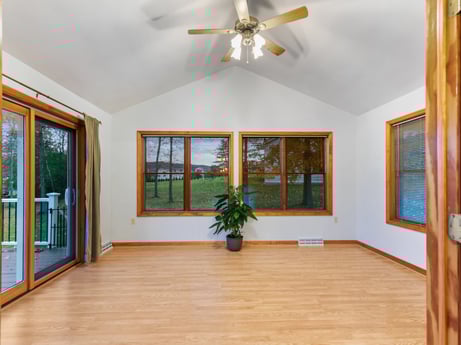 An image featuring property, ceiling fan, plant, window, wood, interior design, lighting, architecture, building, picture frame at 74 Susquehannock Trail.