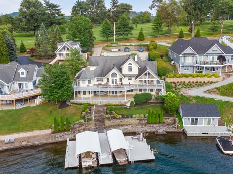 An image featuring water, building, property, window, plant, tree, house, body of water, architecture, watercraft at 218 Point Rd.