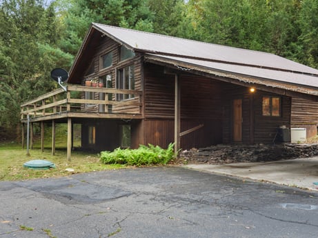 An image featuring plant, property, building, window, tree, wood, house, cottage, roof, rural area at 125 Marcy Rd.