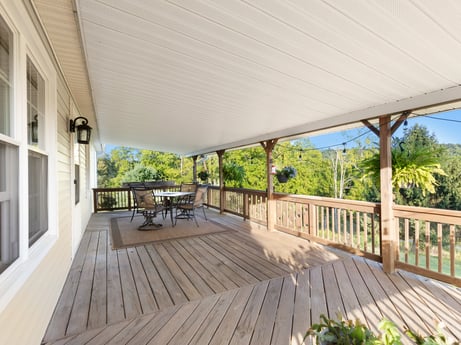 An image featuring plant, porch, wood, tree, shade, window, interior design, floor, wood stain, cottage at 62 Leons Rd.