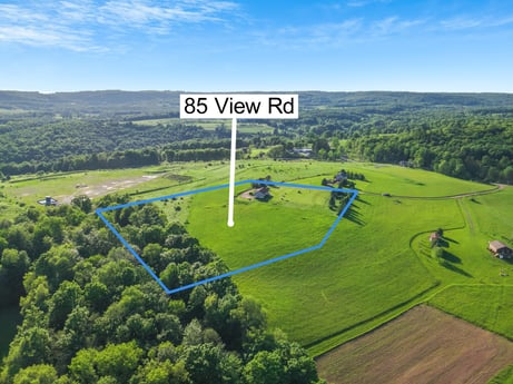An image featuring sky, cloud, ecoregion, plant, natural landscape, natural environment, tree, highland, land lot, slope at 85 View Rd.