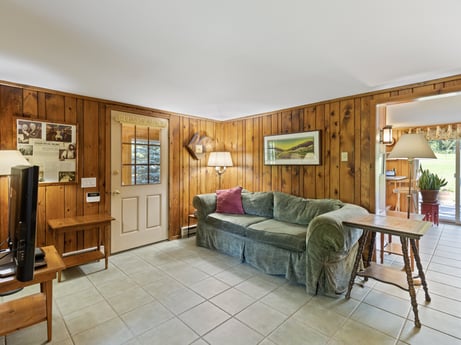 An image featuring furniture, building, table, plant, picture frame, couch, house, wood, interior design, comfort at 130 Haighs Pond Rd.