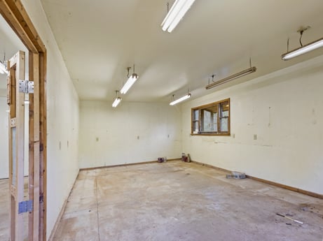 An image featuring fixture, window, hall, wood, flooring, floor, building, ceiling, door, building material at 2266 Liberty Corners Rd.