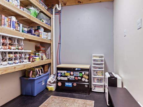 An image featuring building, shelf, shelving, publication, house, room, flooring, retail, machine, table at 144 Milton Ln.