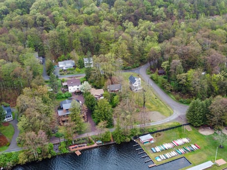 An image featuring water, plant, water resources, property, building, nature, tree, land lot, urban design, bank at 103 Mokoma Ave.