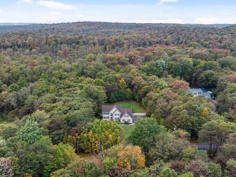 An image featuring cloud, plant, sky, window, natural landscape, tree, land lot, mountainous landforms, landscape, city at 92 Sunrise Dr.