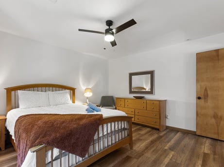 An image featuring property, cabinetry, ceiling fan, window, wood, lighting, comfort, interior design, drawer, fixture at 125 Rimstone Ct.