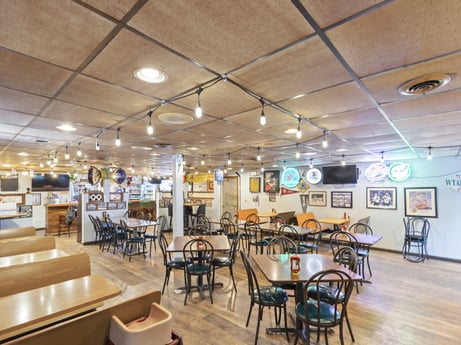 An image featuring furniture, table, chair, building, floor, event, ceiling, flooring, wood, function hall at 199 State St.