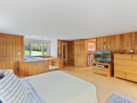 An image featuring cabinetry, furniture, property, comfort, drawer, wood, building, interior design, door, floor at 130 Haighs Pond Rd.