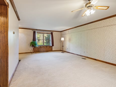 An image featuring wood, fixture, building, floor, flooring, wall, hall, house, ceiling fan, ceiling at 2266 Liberty Corners Rd.