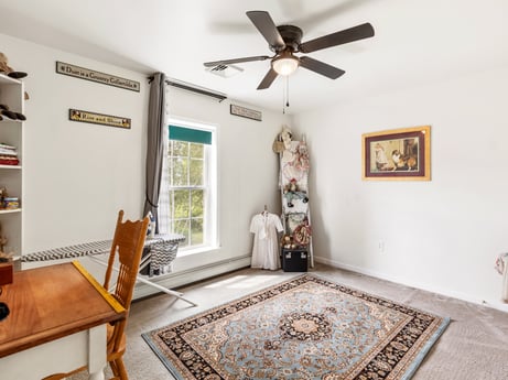 An image featuring property, picture frame, furniture, ceiling fan, wood, interior design, window, architecture, flooring, floor at 105 Thomas St.