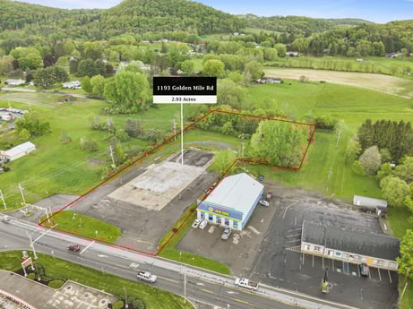 An image featuring plant, infrastructure, tree, sky, land lot, grass, urban design, biome, asphalt, real estate at 1195 Golden Mile Rd.