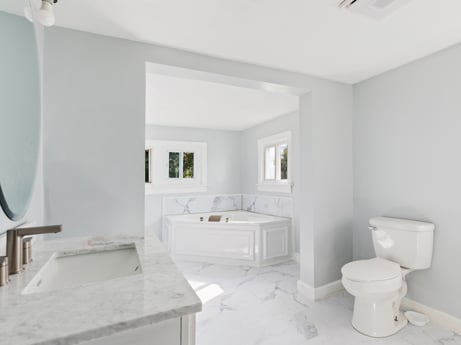 An image featuring property, window, plumbing fixture, building, bathroom cabinet, interior design, bathroom, floor, grey, wood at 203 Harrison St.