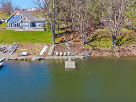 An image featuring water, plant, water resources, building, window, tree, house, lake, watercourse, natural landscape at 144 Milton Ln.