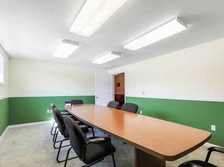 An image featuring table, furniture, building, chair, wood, interior design, fixture, flooring, floor, desk at 213 Main St.