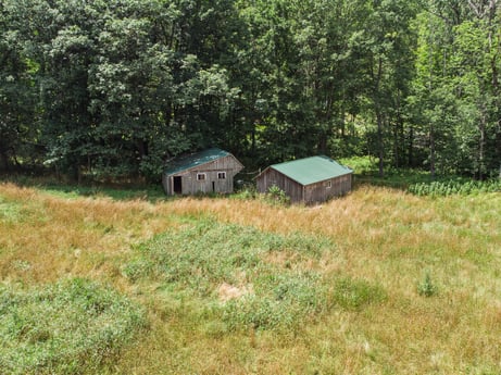 An image featuring plant, plant community, natural landscape, tree, land lot, house, landscape, grassland, groundcover, rural area at 154 Fox Run Rd.