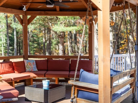 An image featuring property, furniture, lighting, wood, shade, interior design, wall, leisure, real estate, couch at 125 Rimstone Ct.