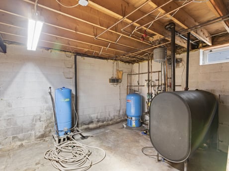 An image featuring building, house, floor, flooring, gas, machine, wood, ceiling, room, basement at 815 Lakeside Dr.