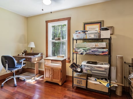 An image featuring furniture, wood, table, floor, window, flooring, living room, home appliance, comfort, hardwood at 145 Nichols Ln.