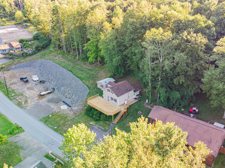 An image featuring plant, plant community, tree, botany, natural landscape, vegetation, grass, biome, urban design, shrub at 127 Shore Dr.