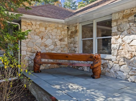 An image featuring plant, property, building, window, wood, road surface, brickwork, house, brick, door at 125 Rimstone Ct.