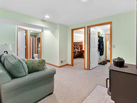 An image featuring furniture, property, comfort, interior design, architecture, wood, living room, flooring, floor, door at 459 Pine Hill Dr.