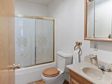 An image featuring mirror, property, bathroom cabinet, plumbing fixture, sink, tap, bathroom sink, bathroom, wood, fixture at 815 Lakeside Dr.