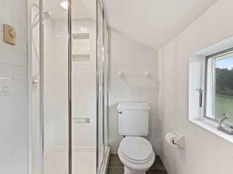 An image featuring building, property, plumbing fixture, window, bathroom, fixture, toilet seat, interior design, house, toilet at 130 Haighs Pond Rd.