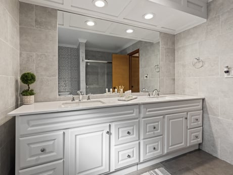 An image featuring mirror, tap, bathroom cabinet, cabinetry, sink, countertop, property, furniture, plumbing fixture, wood at 125 Rimstone Ct.
