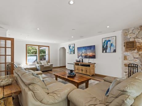 An image featuring couch, table, picture frame, furniture, comfort, houseplant, studio couch, living room, interior design, wood at 125 Rimstone Ct.