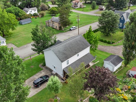 An image featuring plant, building, property, green, tree, car, land lot, grass, vegetation, urban design at 105 Thomas St.