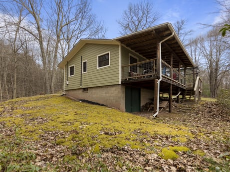 An image featuring sky, plant, property, building, window, wood, tree, house, natural landscape, land lot at English Hollow Ln.