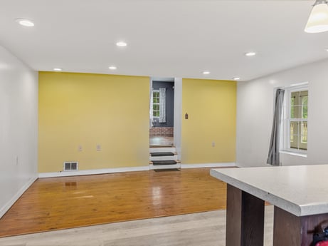 An image featuring fixture, wood, hall, table, floor, flooring, wood stain, material property, hardwood, paint at 5442 Clarkstown Rd.