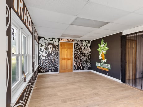 An image featuring wood, hall, interior design, building, floor, flooring, art, living room, ceiling, hardwood at 302 N Keystone Ave.