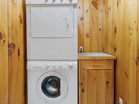 An image featuring laundry room, cabinetry, property, bathroom cabinet, drawer, fixture, wood, kitchen appliance, window, home appliance at 130 Haighs Pond Rd.