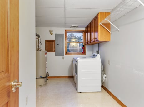 An image featuring property, building, fixture, door, wood, interior design, floor, cabinetry, flooring, wall at 74 Susquehannock Trail.