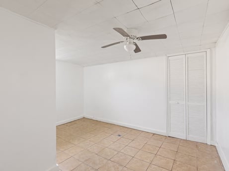 An image featuring ceiling fan, wood, building, line, floor, material property, flooring, mechanical fan, fixture, composite material at 203 Harrison St.